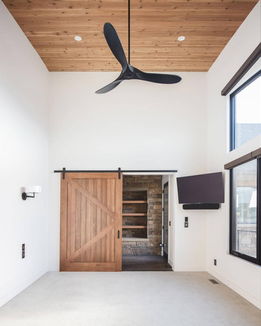 ceiling fan, wood ceiling, sliding barn door - Waterford custom home